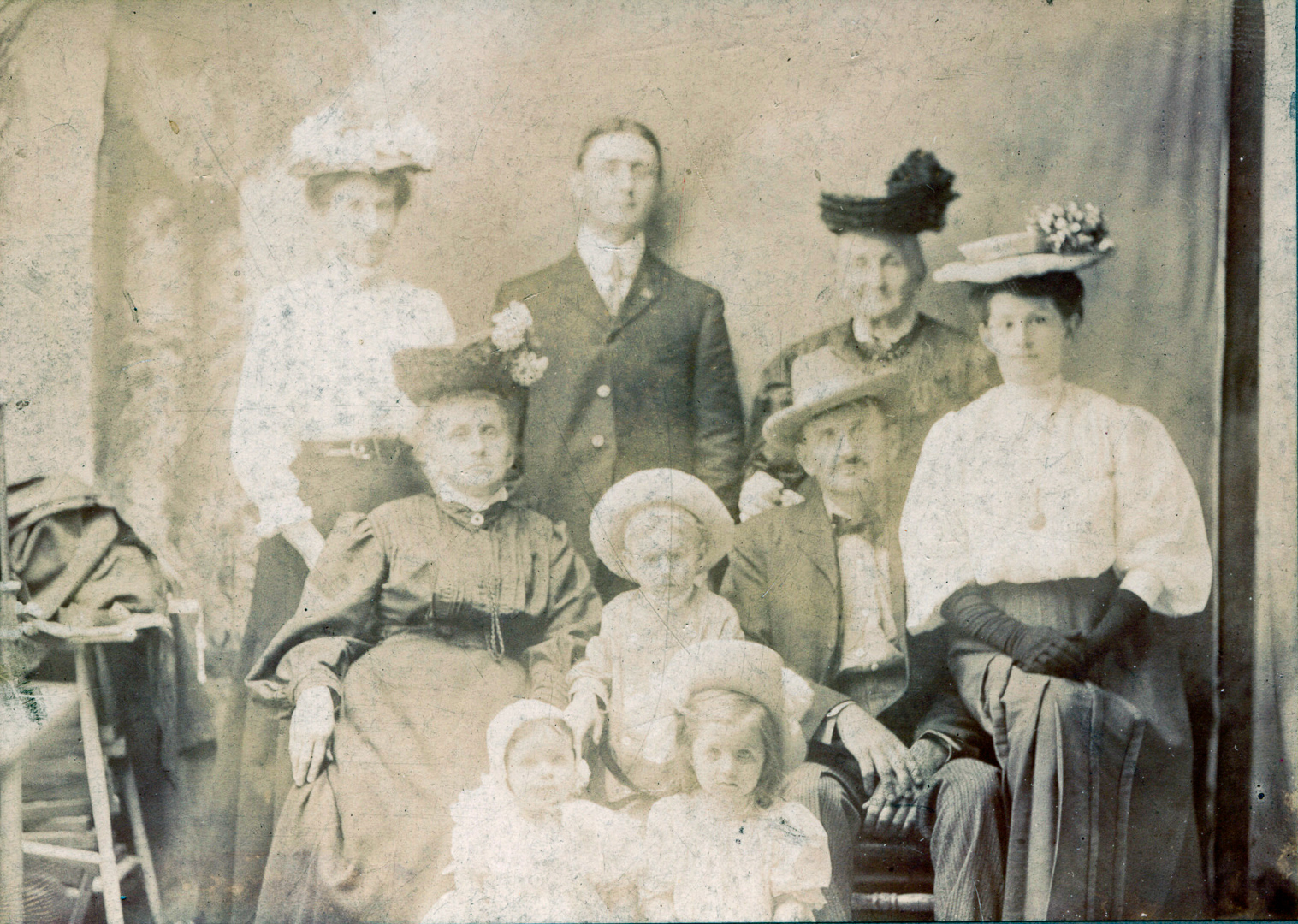[Toohey Family; back: Sarah Ann, John Patrick (or possibly James Asa), Kate (probable); middle seated: Mary, James, Margaret; children front: Joseph M., William L, Jeremiah Toohey; cira 1896]